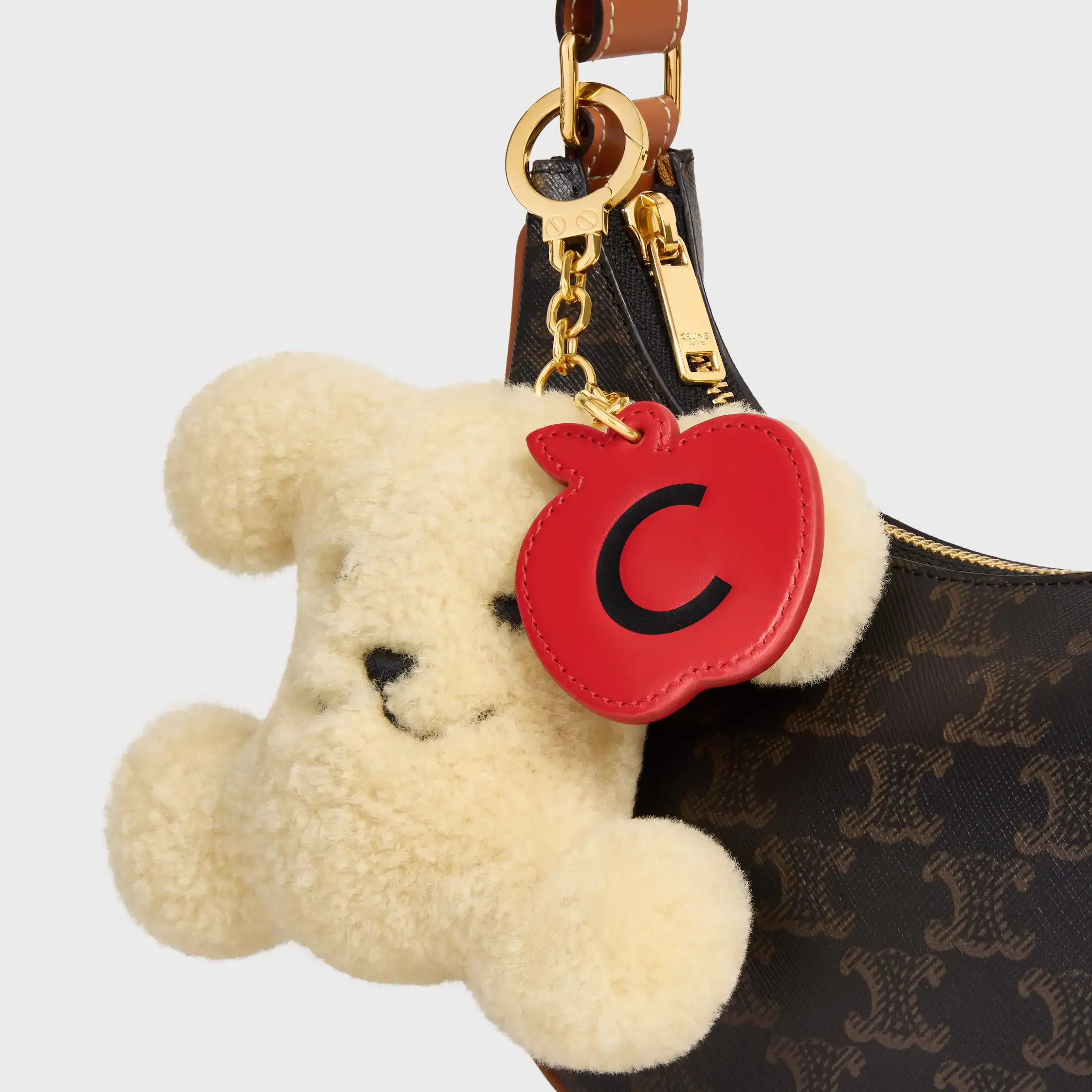 TRIOMPHE POM-POM-CHARM APPLE IN SCHAFWOLL UND KALBSLEDER