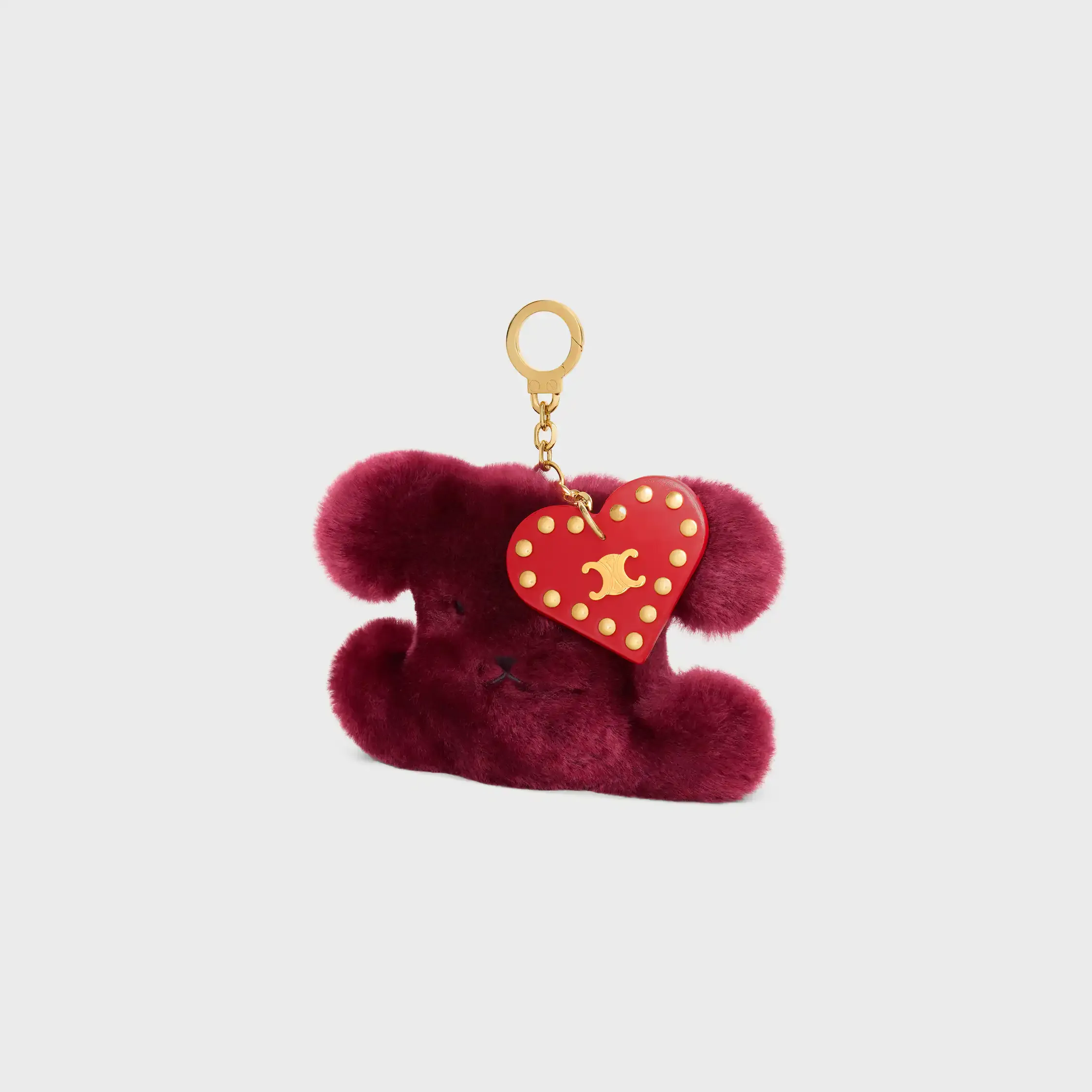 TRIOMPHE POM-POM-CHARM AUS BESTICKTEM SCHAFPELZ UND KALBSLEDER