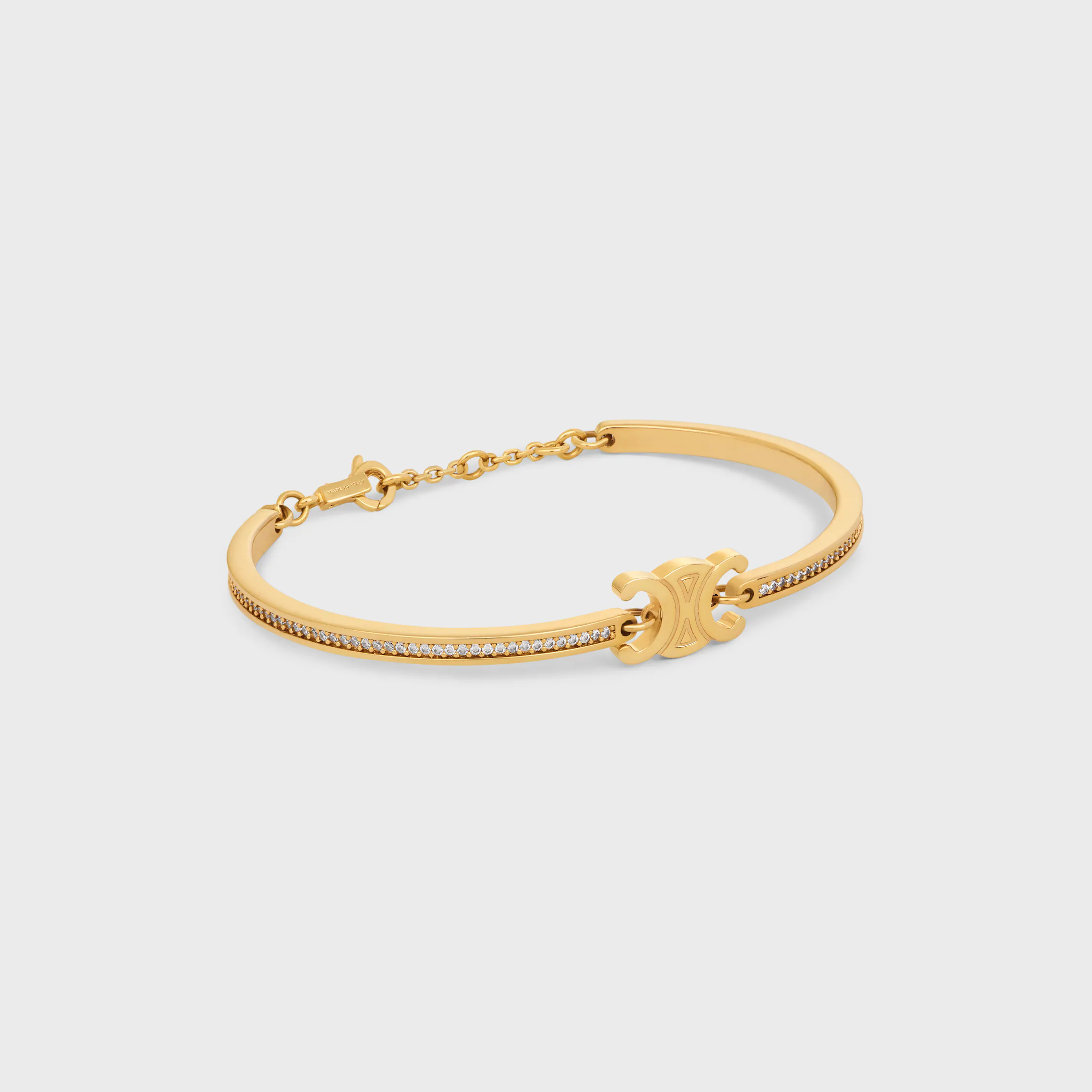 Triomphe Gelenkter Glitzerarmband aus Strass und Messing mit Goldfinish