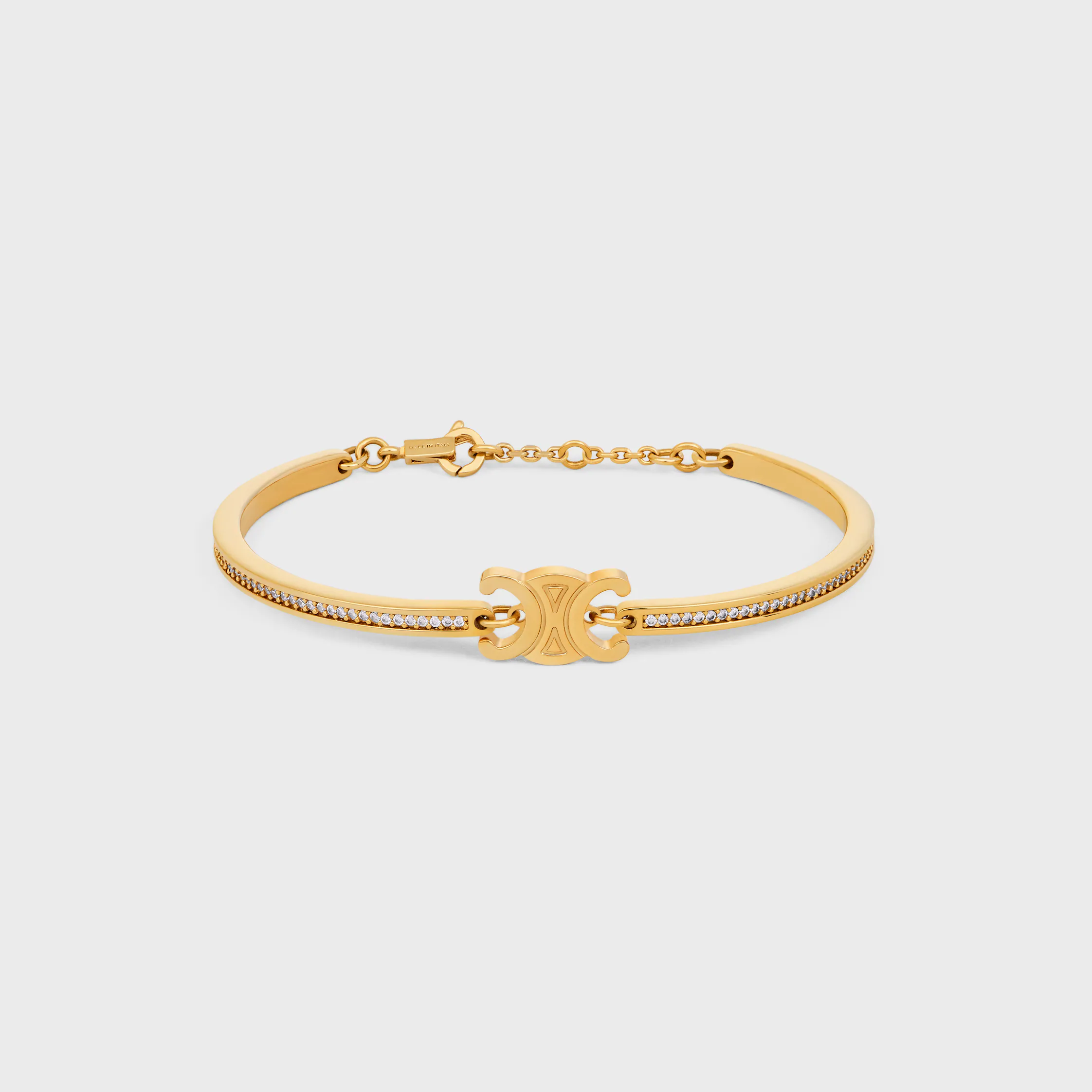 Triomphe Gelenkter Glitzerarmband aus Strass und Messing mit Goldfinish
