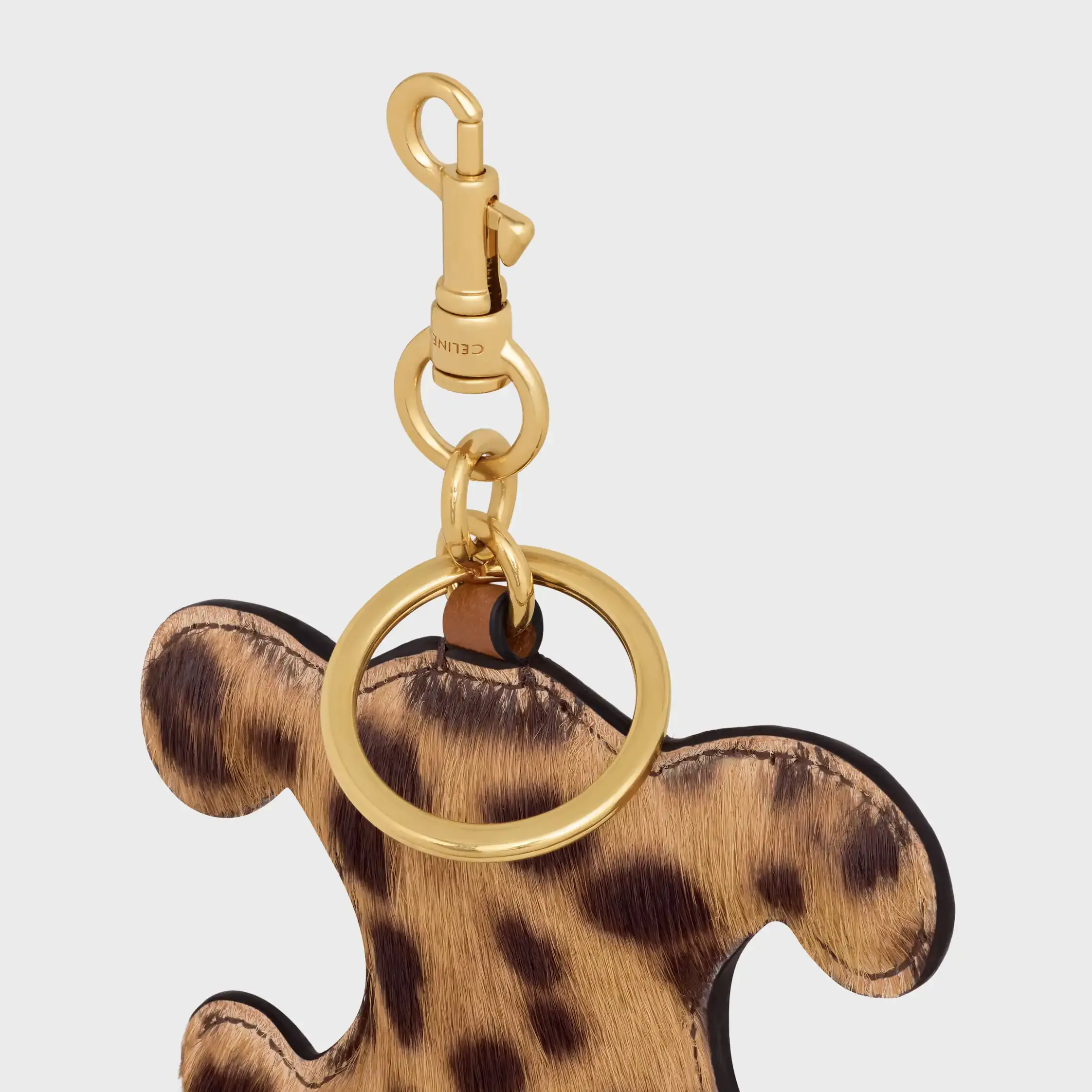 TRIOMPHE Pompon-Aufhänger im PONY-Design mit Leopardenmuster und Kalbsleder