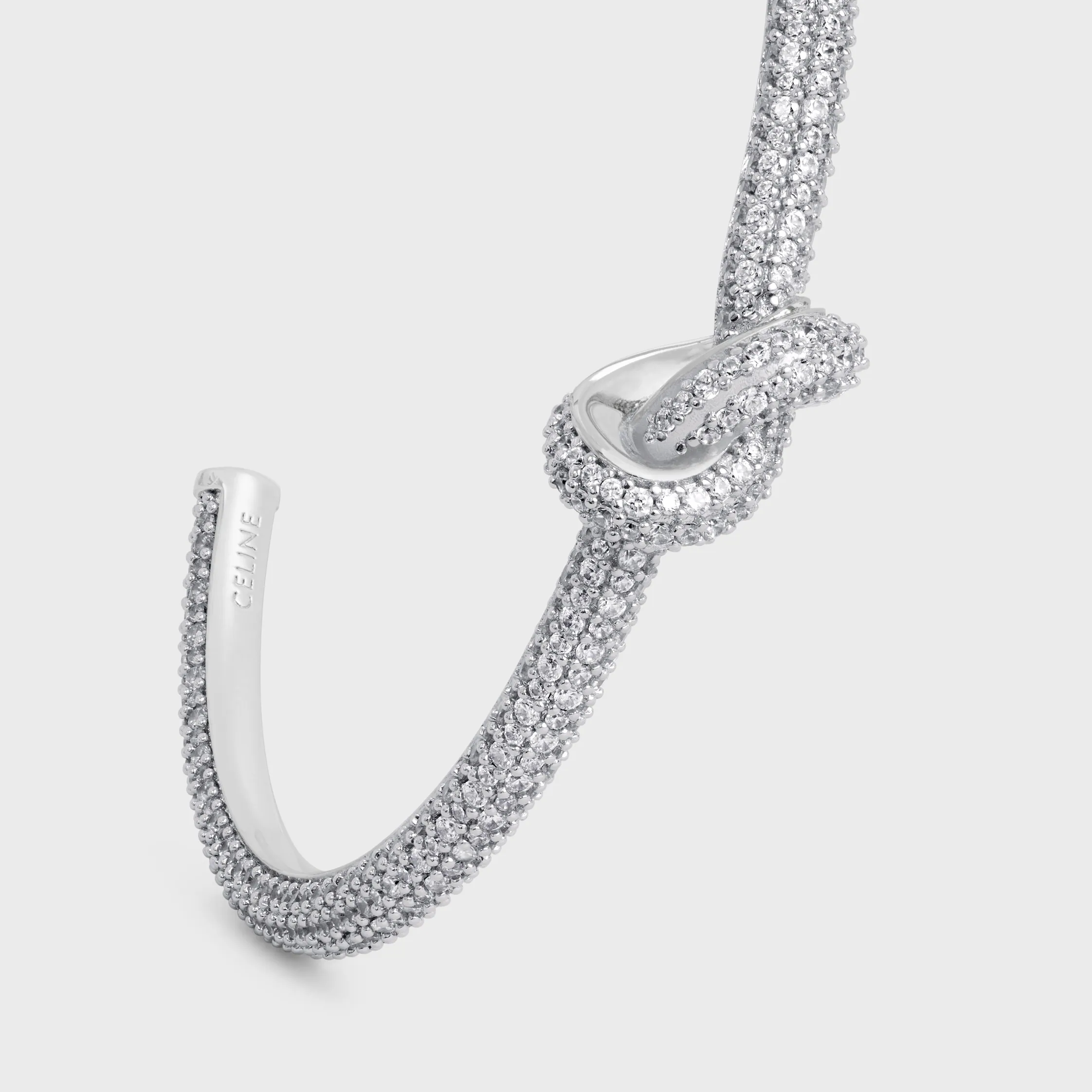 Knot Sparkle Cuff in Strass und Messing mit Rhodium-Oberfläche