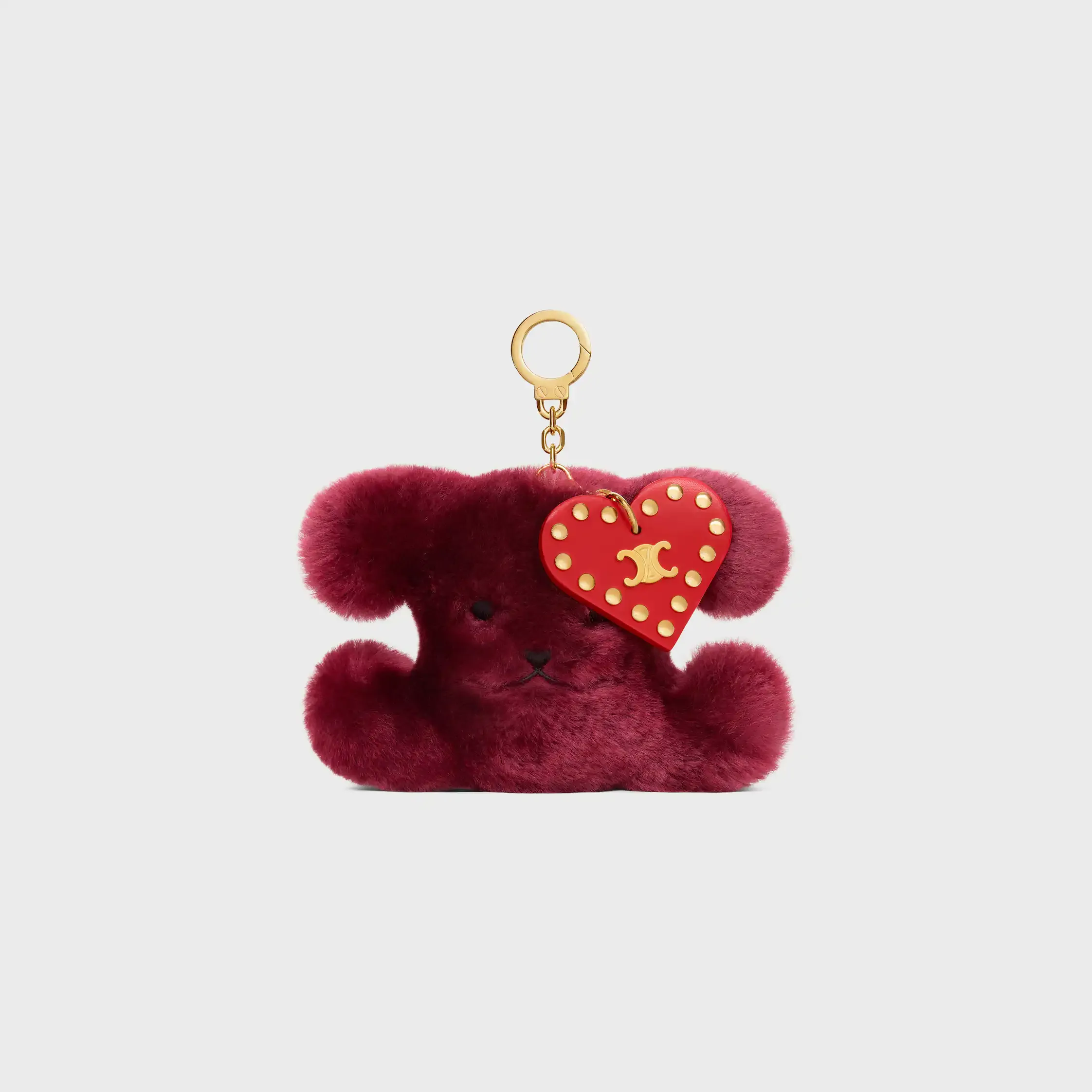 TRIOMPHE POM-POM-CHARM AUS BESTICKTEM SCHAFPELZ UND KALBSLEDER