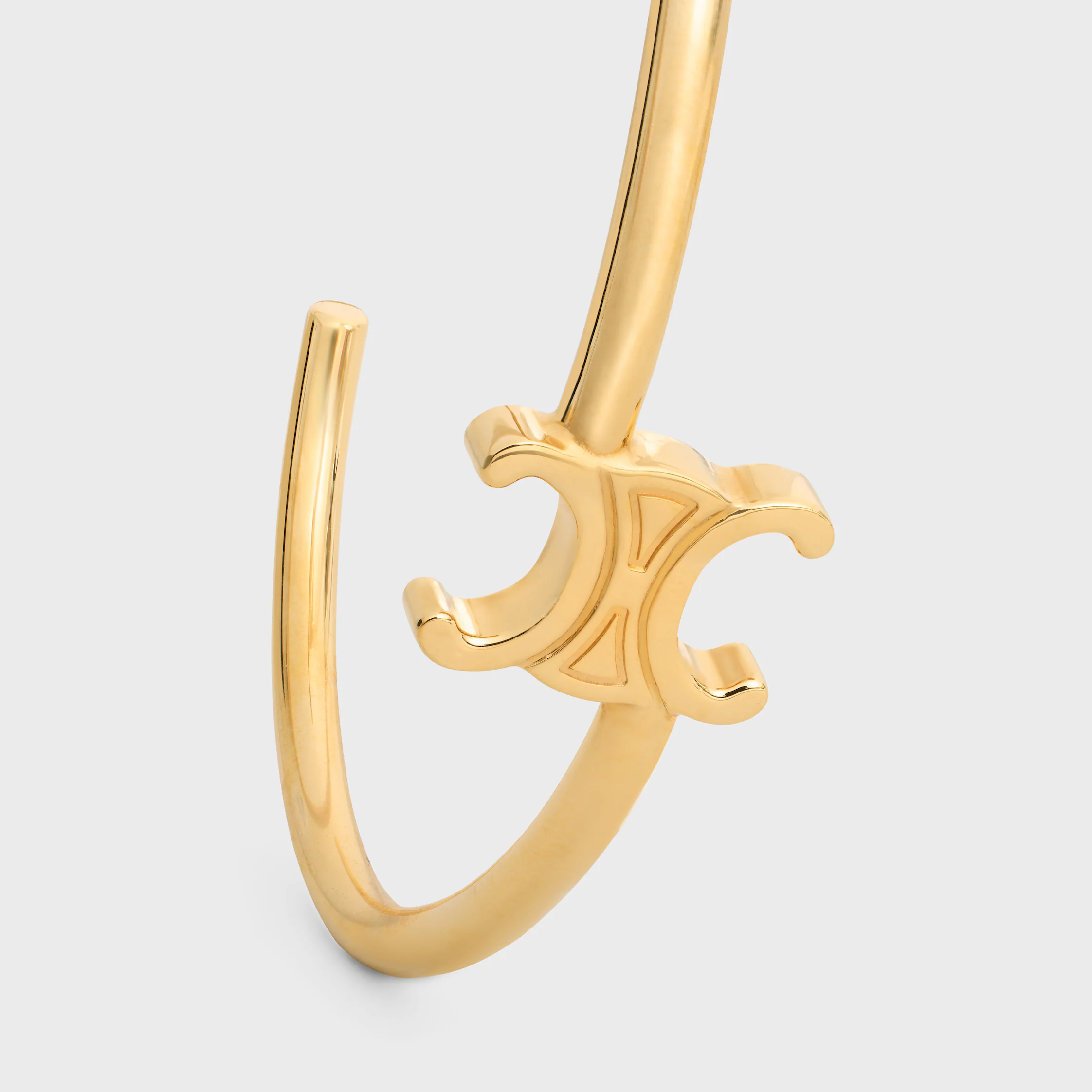 Triomphe asymmetrischer Manschettenknopf aus Messing mit Goldfinish