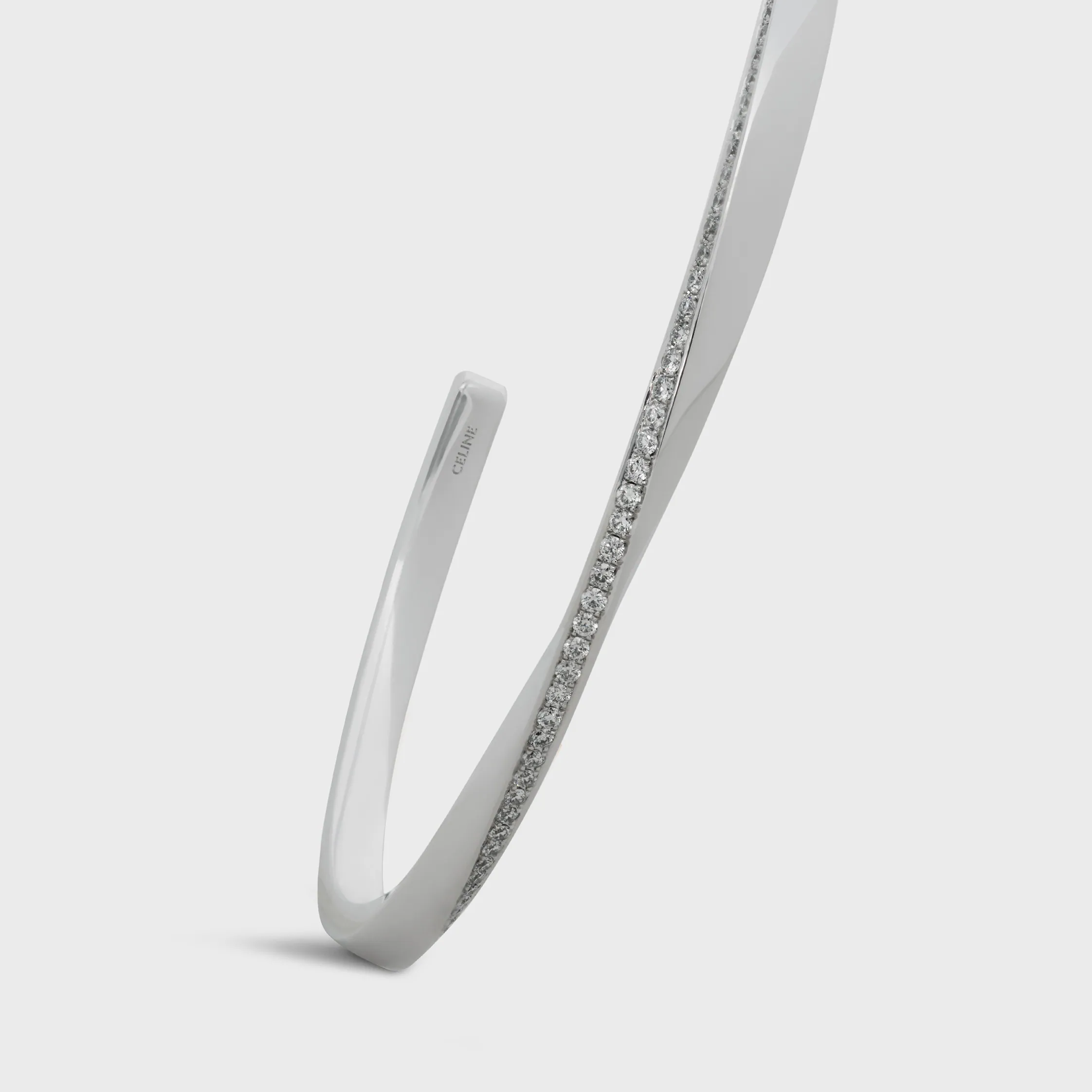 Torsionsarmband aus Weißgold und Diamanten