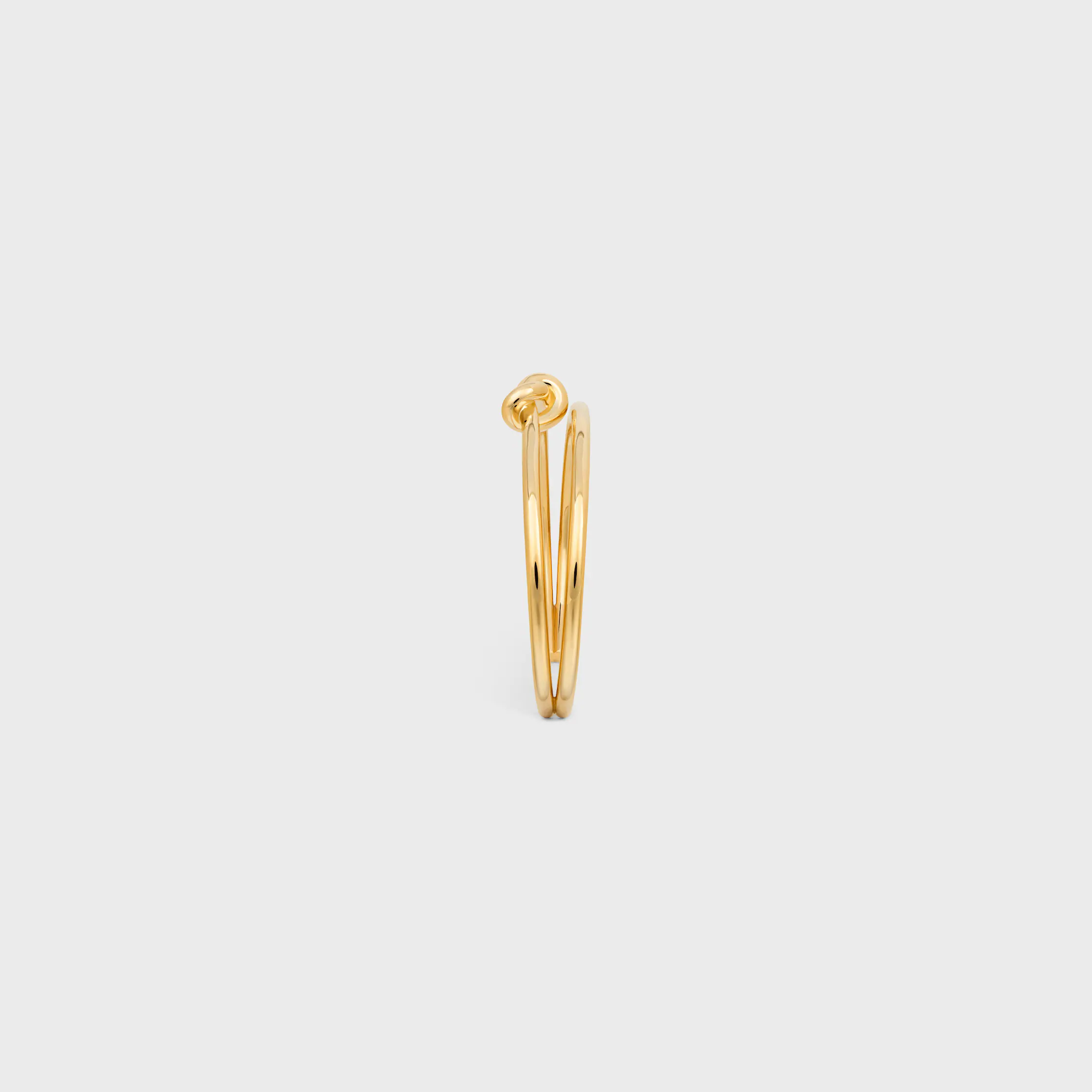 Knot Doppelknopf aus Messing mit Goldfinish