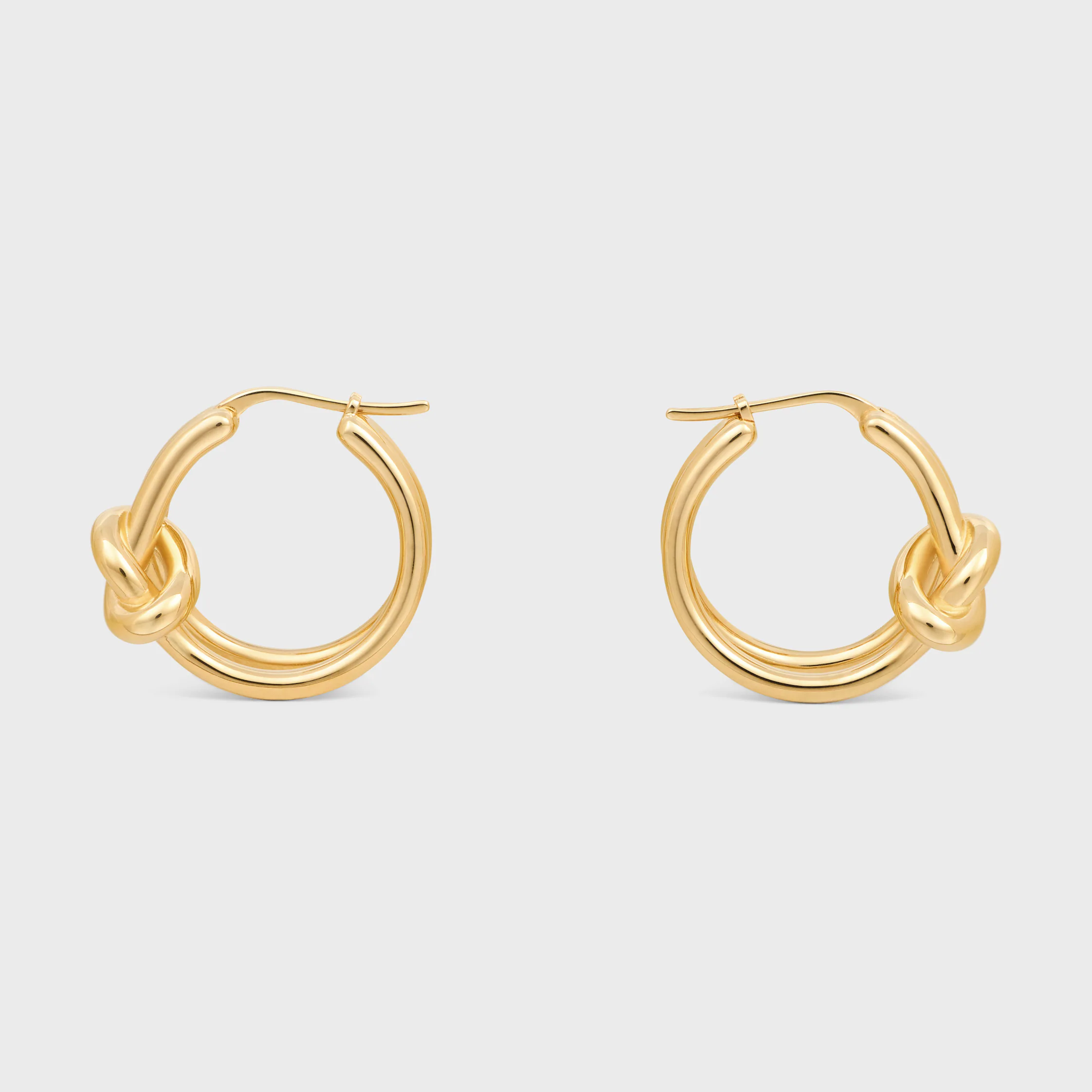 Knot-Doppel-Ohrringe aus Messing mit Goldfinish
