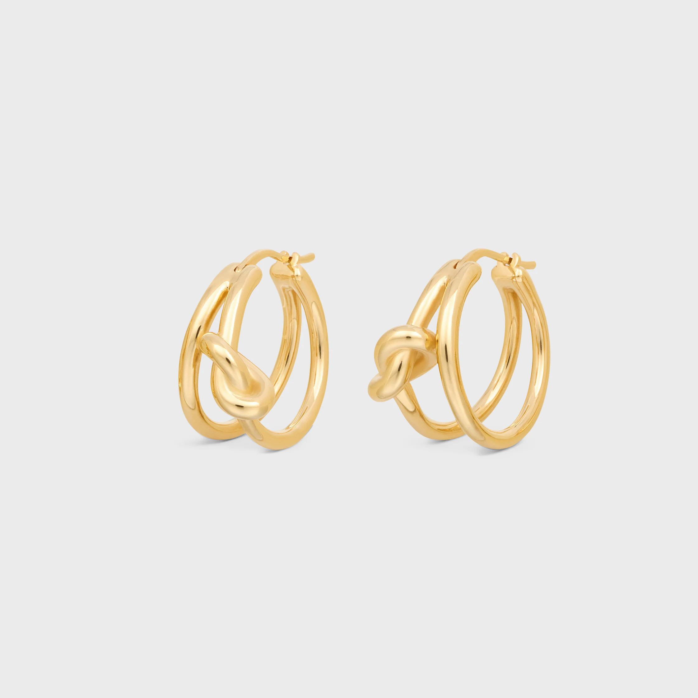 Knot-Doppel-Ohrringe aus Messing mit Goldfinish